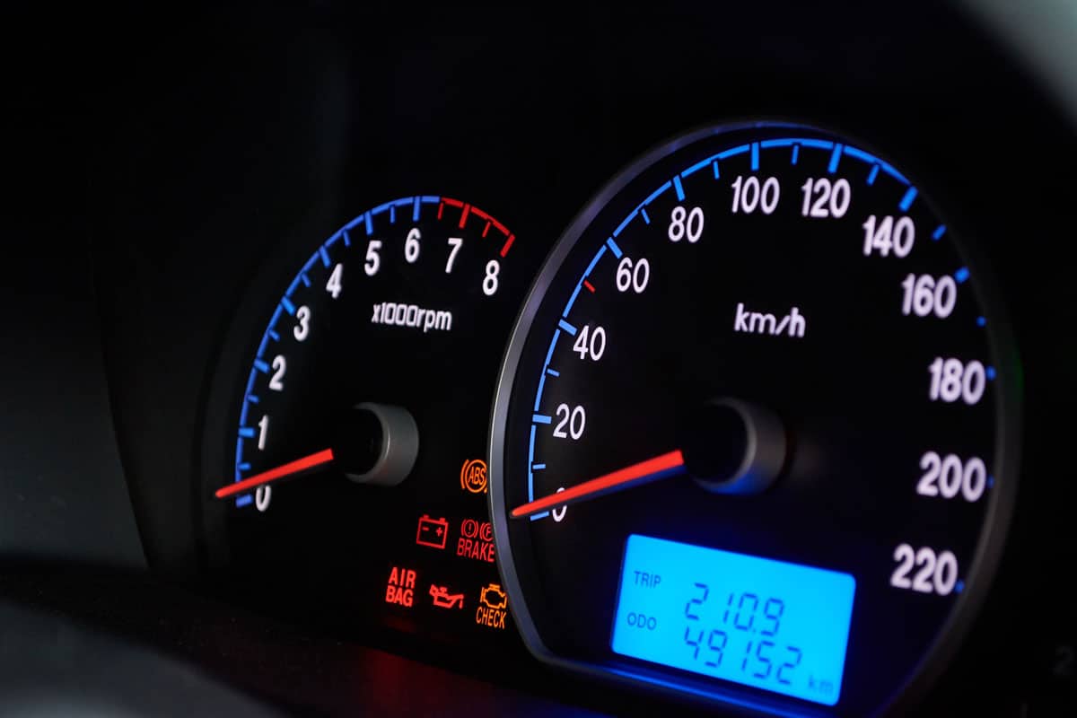 photo of a car vehicle speedometer blue red light gauges digital led blue light