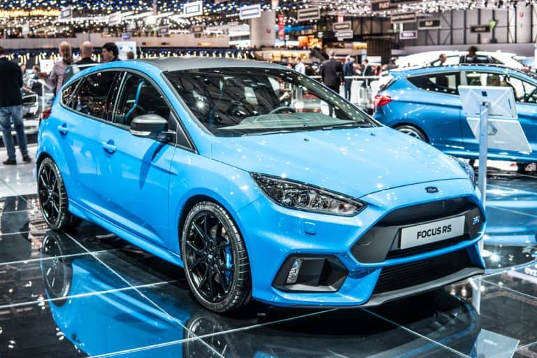 photo of a sky blue color paint on brand new ford focus on the display, Ford Focus Says Transmission Fault Service Now? Here's What To Do