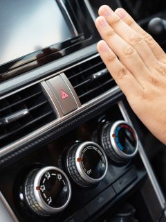 A woman caught the steering wheel of a car while driving to work - Mitsubishi Outlander AC Light Flashing - Why And What To Do