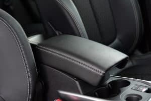 Armrest in the luxury passenger car between the front seats, How To Remove An Armrest From A Car Seat?