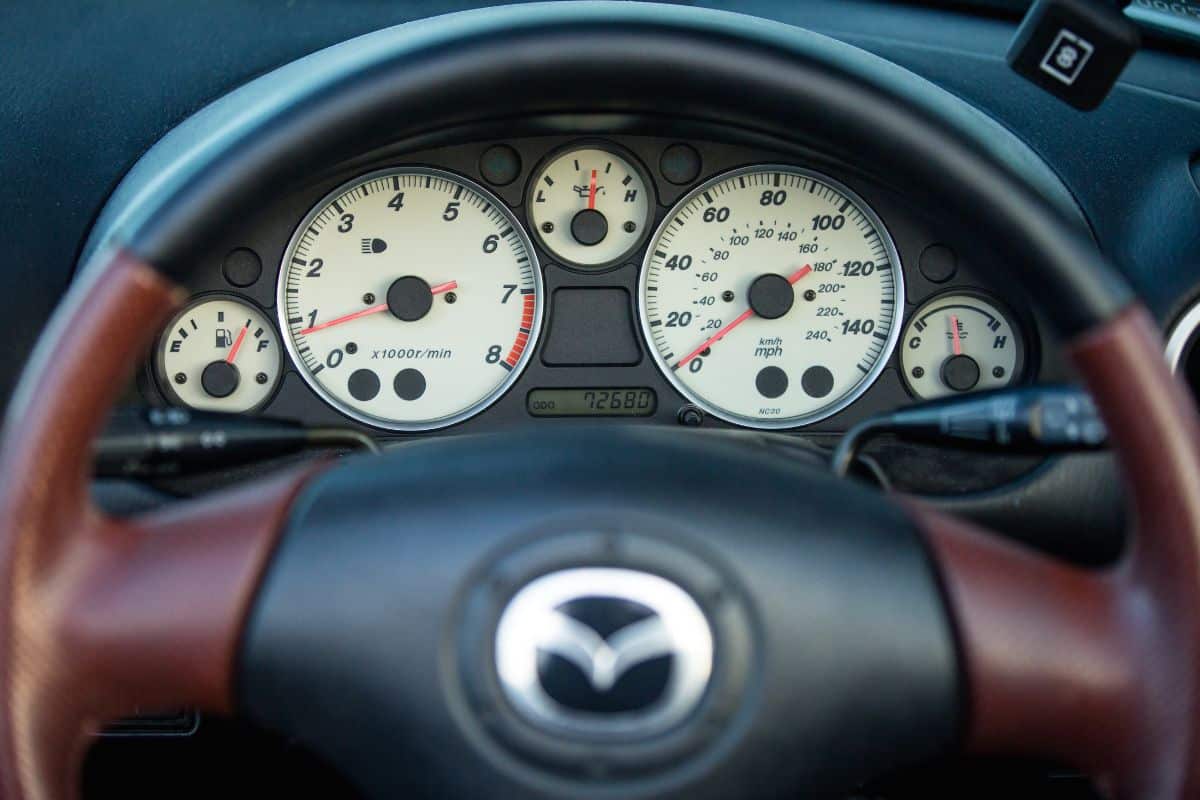 Blackpool, England, 13/05/2020 Mazda MX5 Mark 2 2.5 NB NBFL interior view of the speedometer tachometer miles counter and steering wheel infant of instrument cluster
