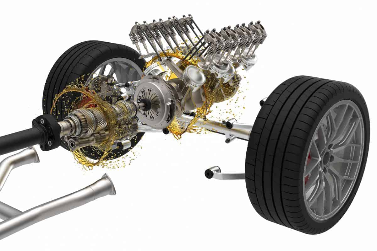 Car chassis with engine and transmission parts in oil on white background. 3D illustration