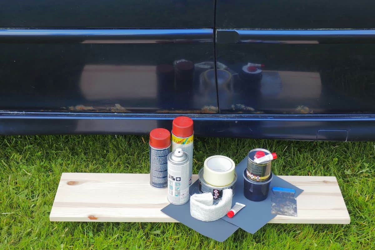 Car rust removal and painting. Car putty, primer and paint spray. Car body care