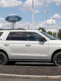 Ford Expedition display at a dealership. Ford offers the Expedition in XL, XLT, Limited and Platinum models., Ford Expedition Window Fell Into The Door—What To Do?