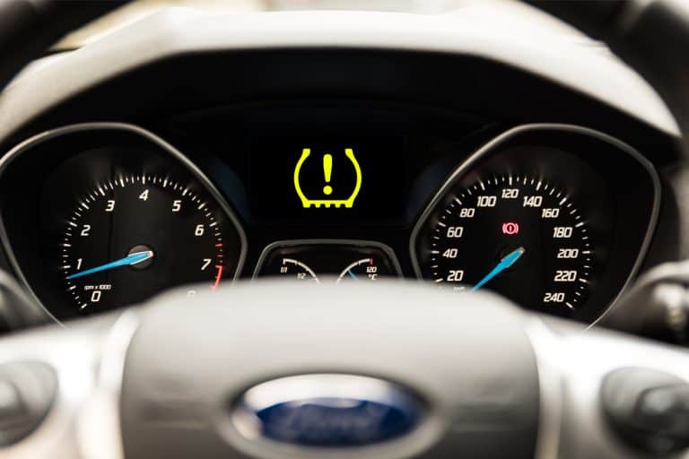Close Up Of Ford Focus Compact Car Dashboard, Ford Tire Pressure Sensor Fault? Here's What To Do