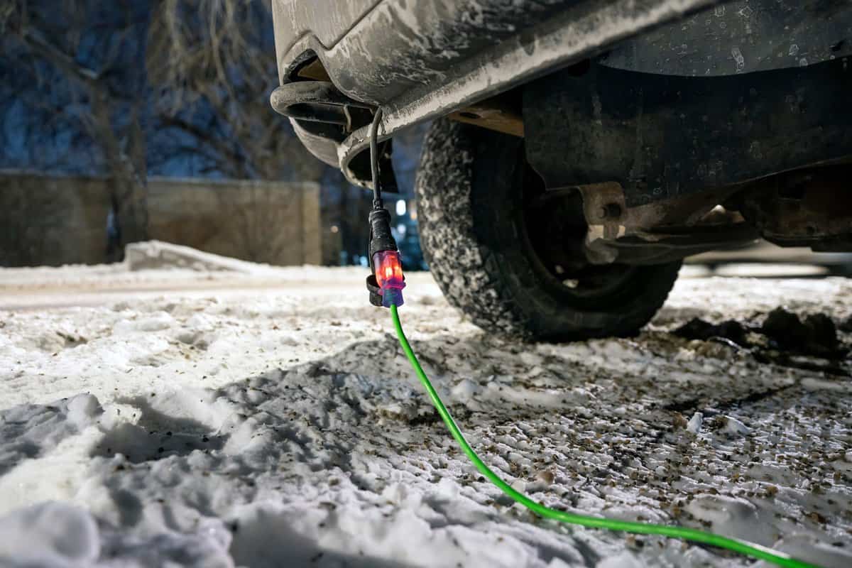 Extension cord plugged into truck in winter