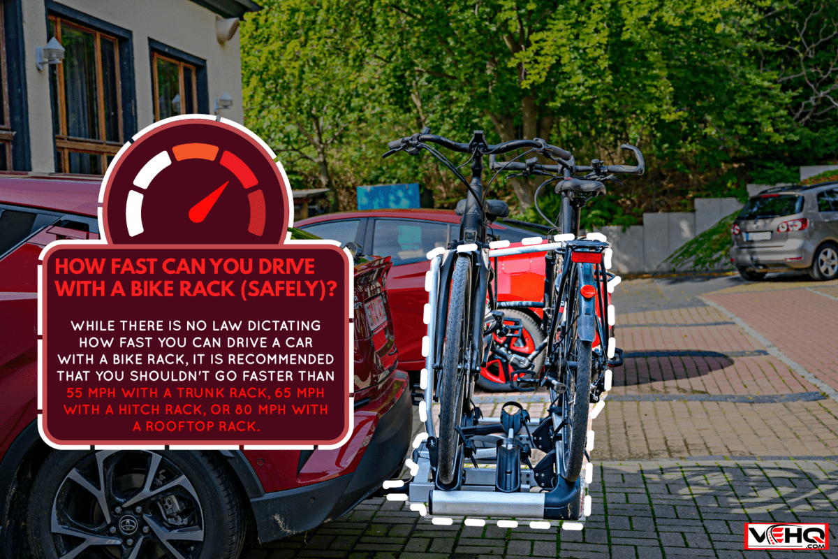 photo of a parked-car-with-a-bike-carrier-attached-to-the-stern, How Fast Can You Drive With A Bike Rack (Safely)?