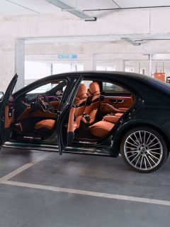 Luxurious Mercedes S Class with open doors, standing on an underground parking lot, How To Get Rid Of Engine Degreaser Smell