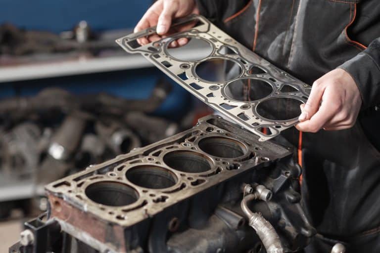 Mechanic disassemble block engine vehicle holding sealing gasket, Head Gasket Not Sealing - Why And What To Do?