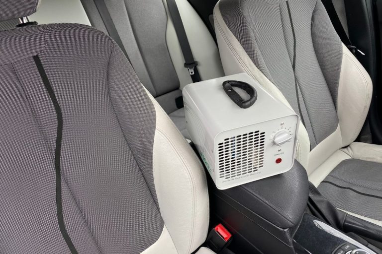 Novosibirsk, Russia – February 22 2021: Mitsubishi Outlander, rear passenger seats in modern sport car, frontal view. - Ozone Generator To Remove Smoke Smell In Car - How To?
