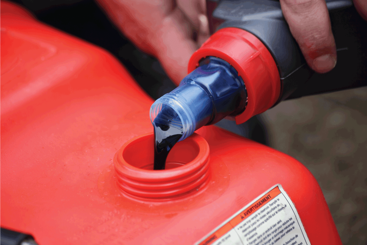 Pouring 2 Т oil into gasoline. Preparation of a fuel mixture for a two stroke. What is the Best Oil for 2 Stroke Lawn Mower