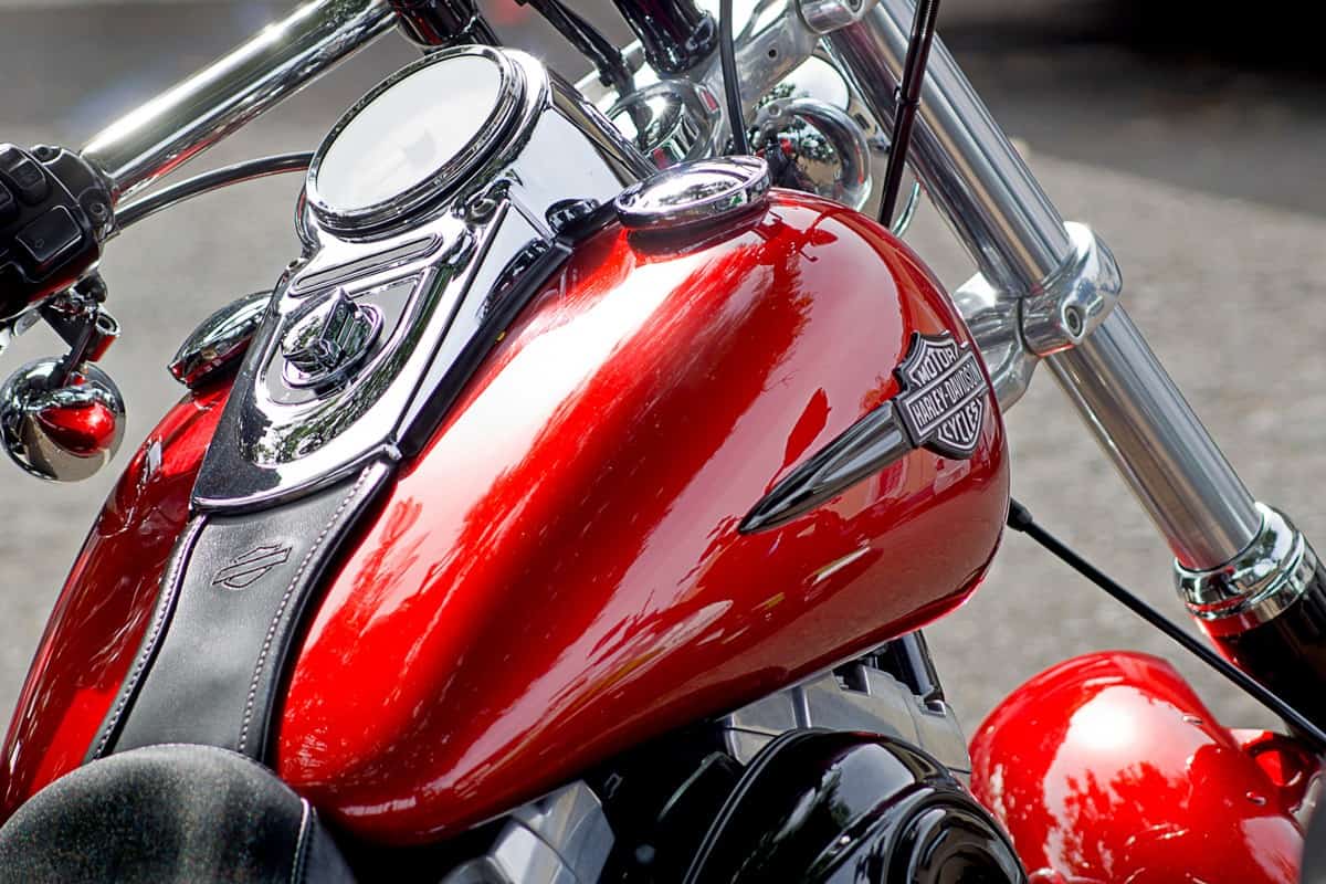 Red glossy painted gas tank of a Harley Davidson