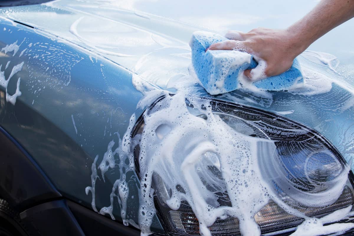 The car wash soapy water cleaning car