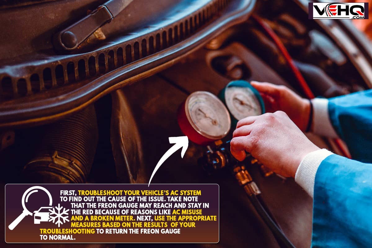 An auto mechanic checking car freon level, Why Is My Freon Gauge In The Red - What To Do?
