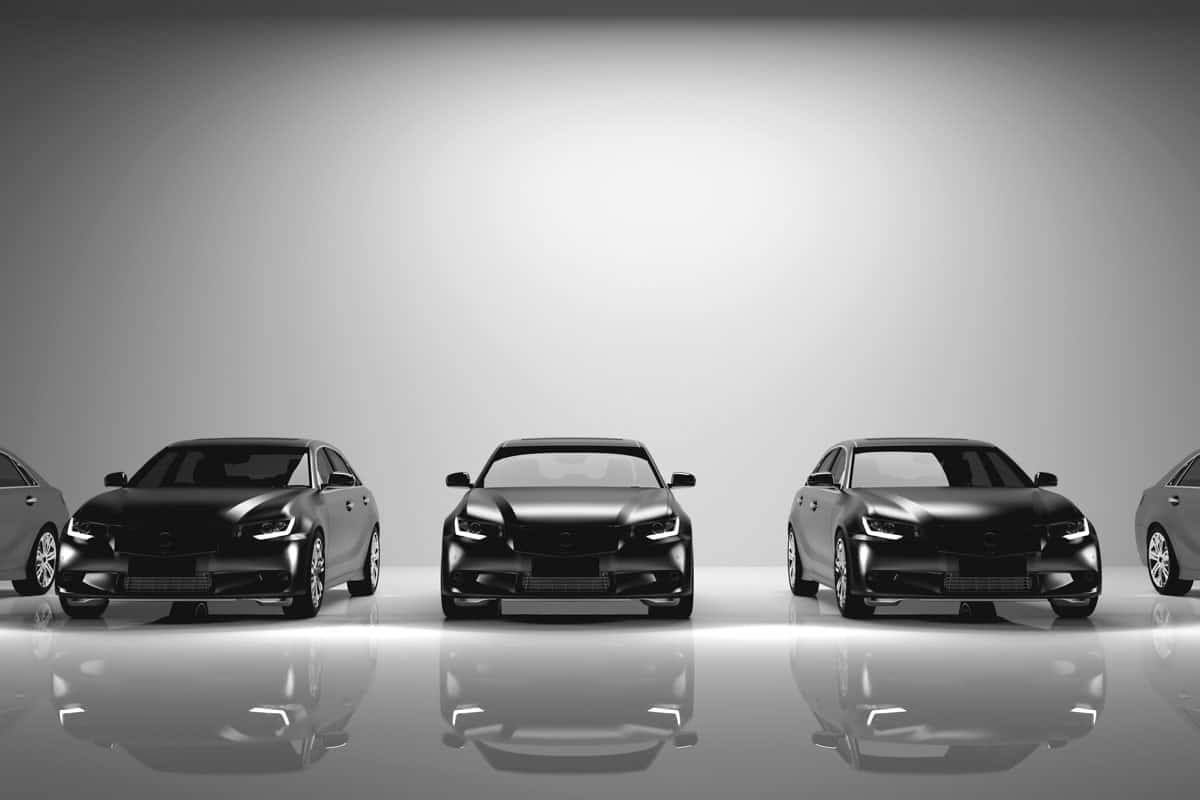 fleet black cars vehicle on light background white glossy floor