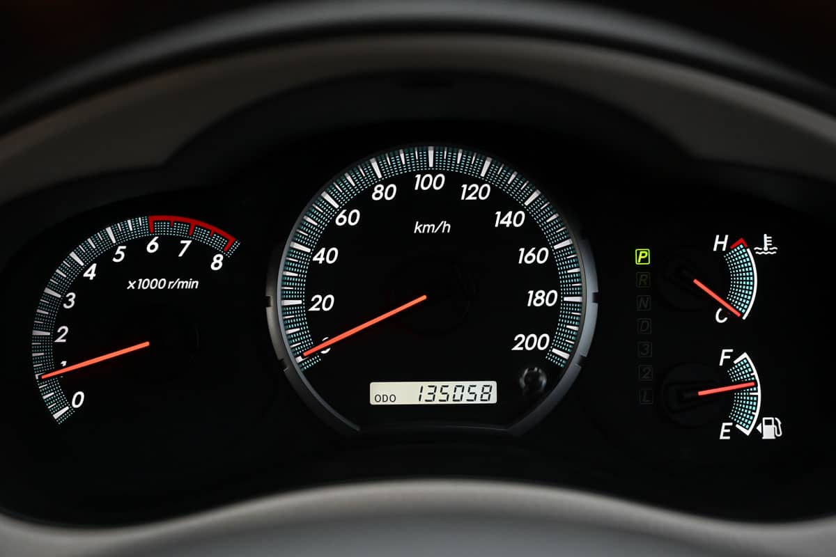 mileage distance on car dashboard digital analog display