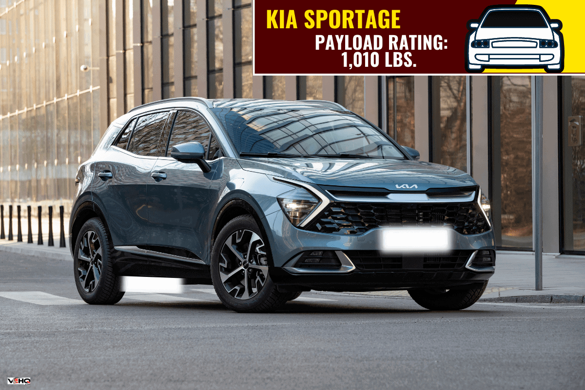 2022 Kia Sportage stopped on a street. This model is one of the most popular compact SUV vehicles. - How Much Weight Can A Kia Sportage