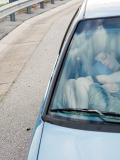A kid sleeping inside a car, How To Cover Car Windows For Privacy Or Sleeping - DIY