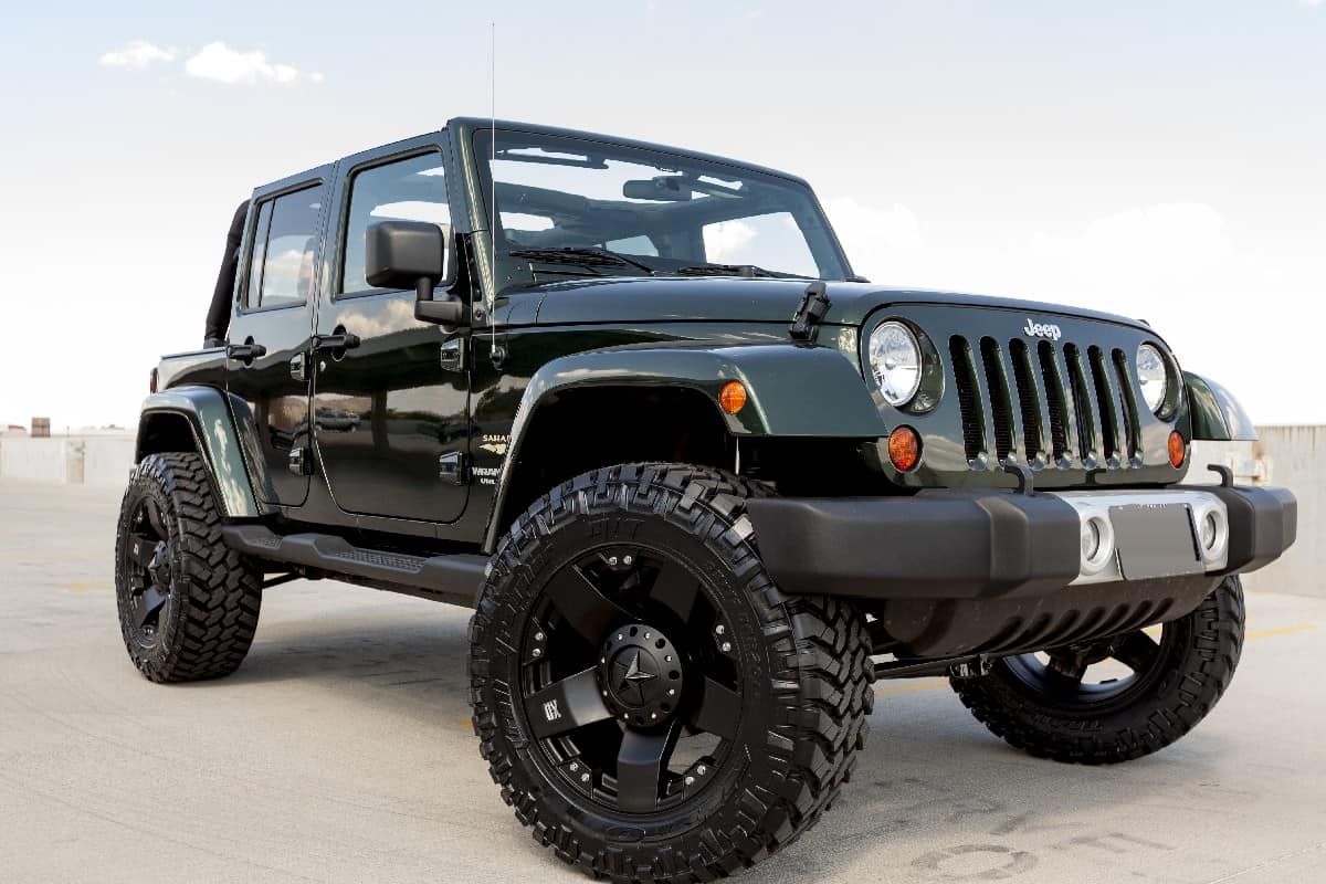 A parked green Jeep Wrangle
