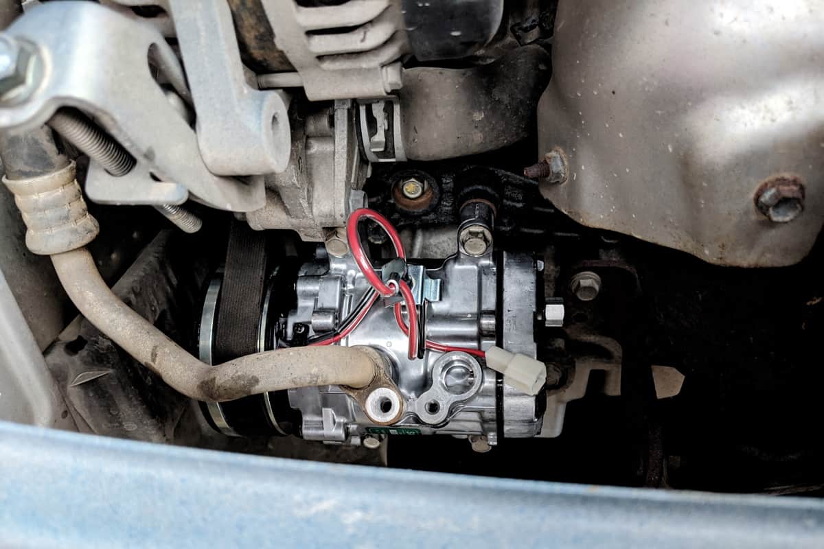 Car aircond compressor during maintanace work.