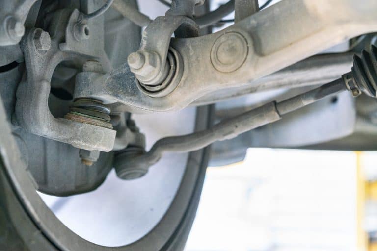 A car bottom view for ball joint and control arm power steering rack suspension system, How to check or ball joint play, Driving On Bad Ball Joints - How Long Can Your Car Go?