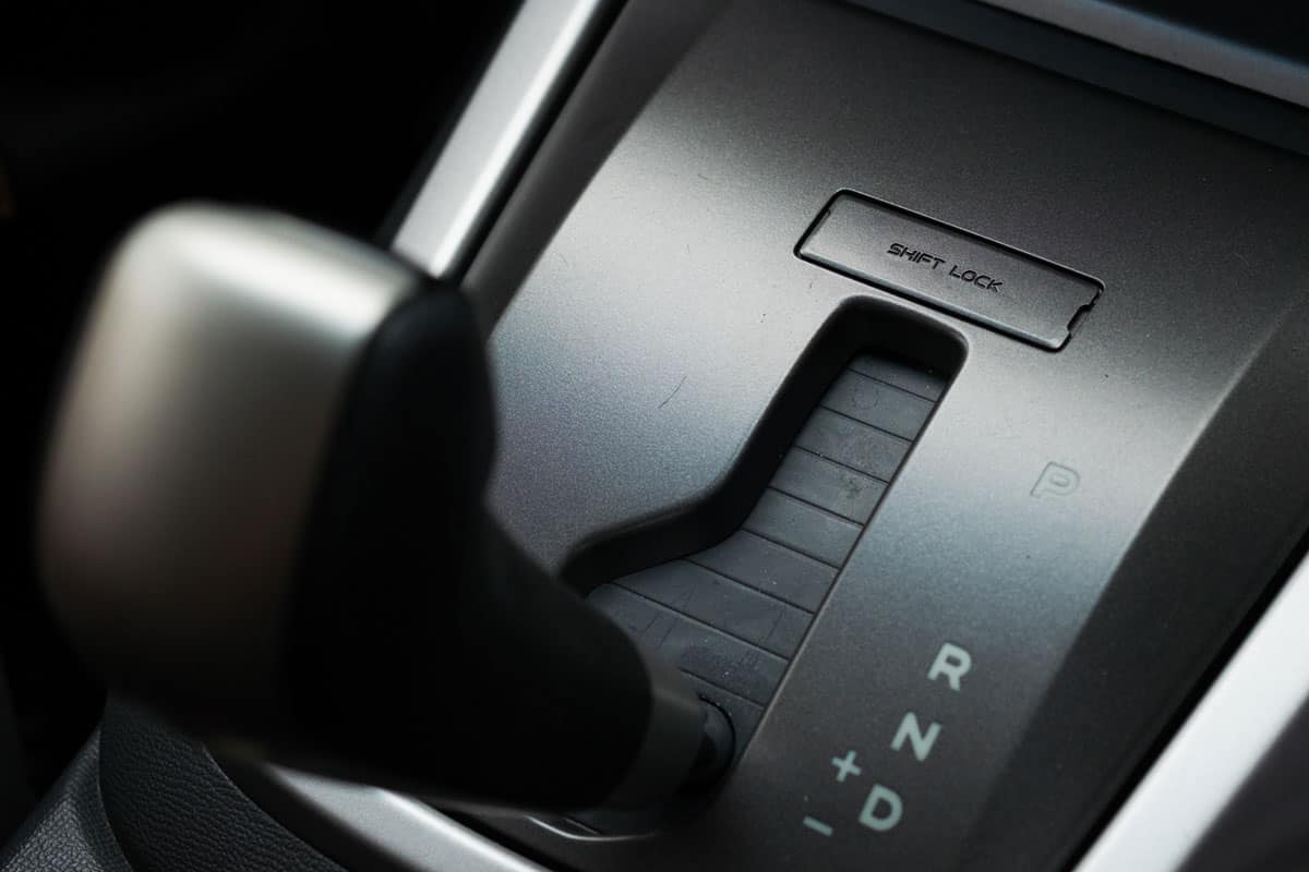 Car interiors shift lock button shifting to first gear to second gear