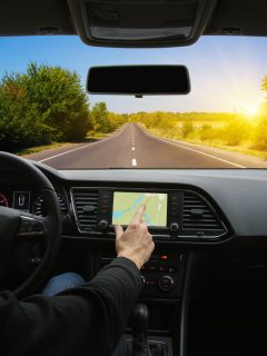 Man hand using GPS navigation inside car, Chrysler Pacifica Navigation Reset - How To?
