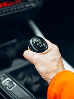 Man's hand switches manual transmission, Transmission Won't Shift Until Warmed Up - Why And What To Do?