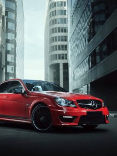 Red car mercedes benz c63 stay on asphalt road in city, How Do I Know If My Mercedes Has Remote Start? [Read This!]