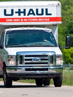U-Haul Moving Truck On Interstate Highway, How Much Weight Can A U-Haul Carry? [Inc. 26 Ft, 20 Ft, 17 Ft, 15 Ft, & 10 Ft]