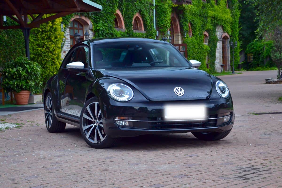 Volkswagen Beetle stopped on the street. The newest Beetle (2011-2019) was produced in Puebla (Mexico).