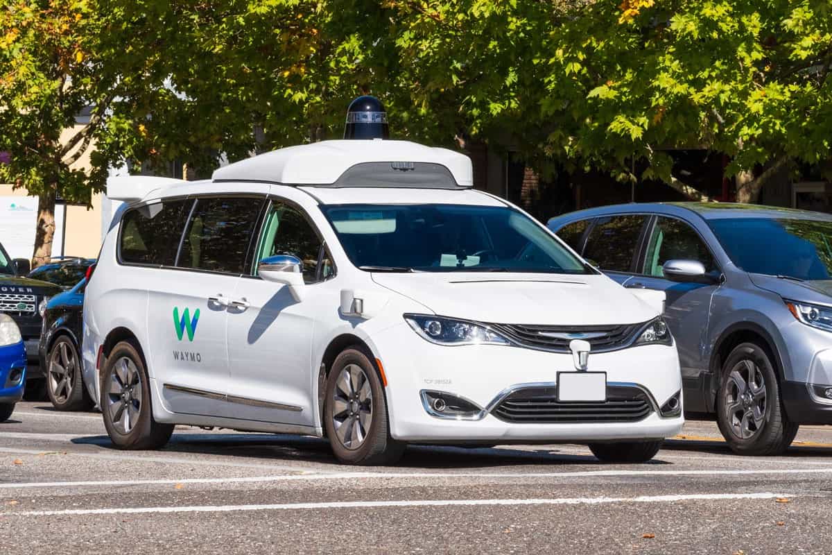 Waymo self driving car performing tests on a street near Google's offices