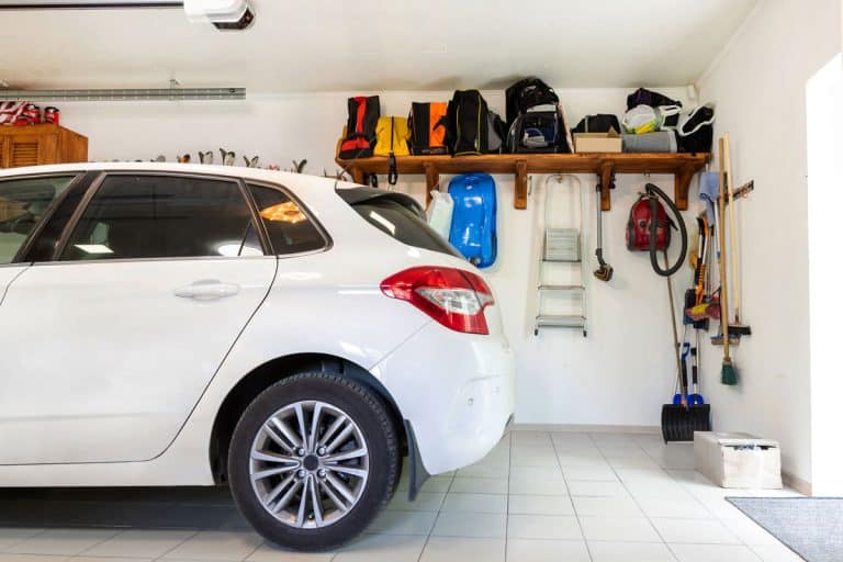 home-suburban-car-garage-interior-wooden-closet, How To Vent Car Exhaust In Your Garage [Safely & Effectively]