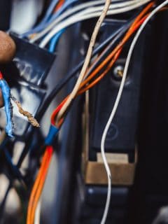 repair electrics in the car, broken wires closeup