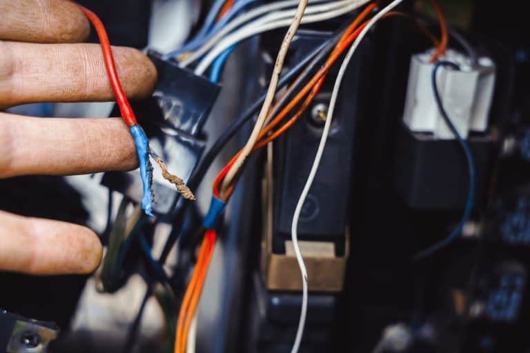 repair electrics in the car, broken wires closeup