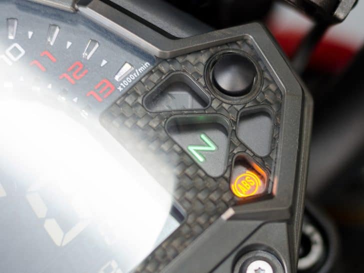 An anti-lock braking system ABS light on motorcycle dashboard, Harley Davidson ABS Light Flashing - Why? What To Do?