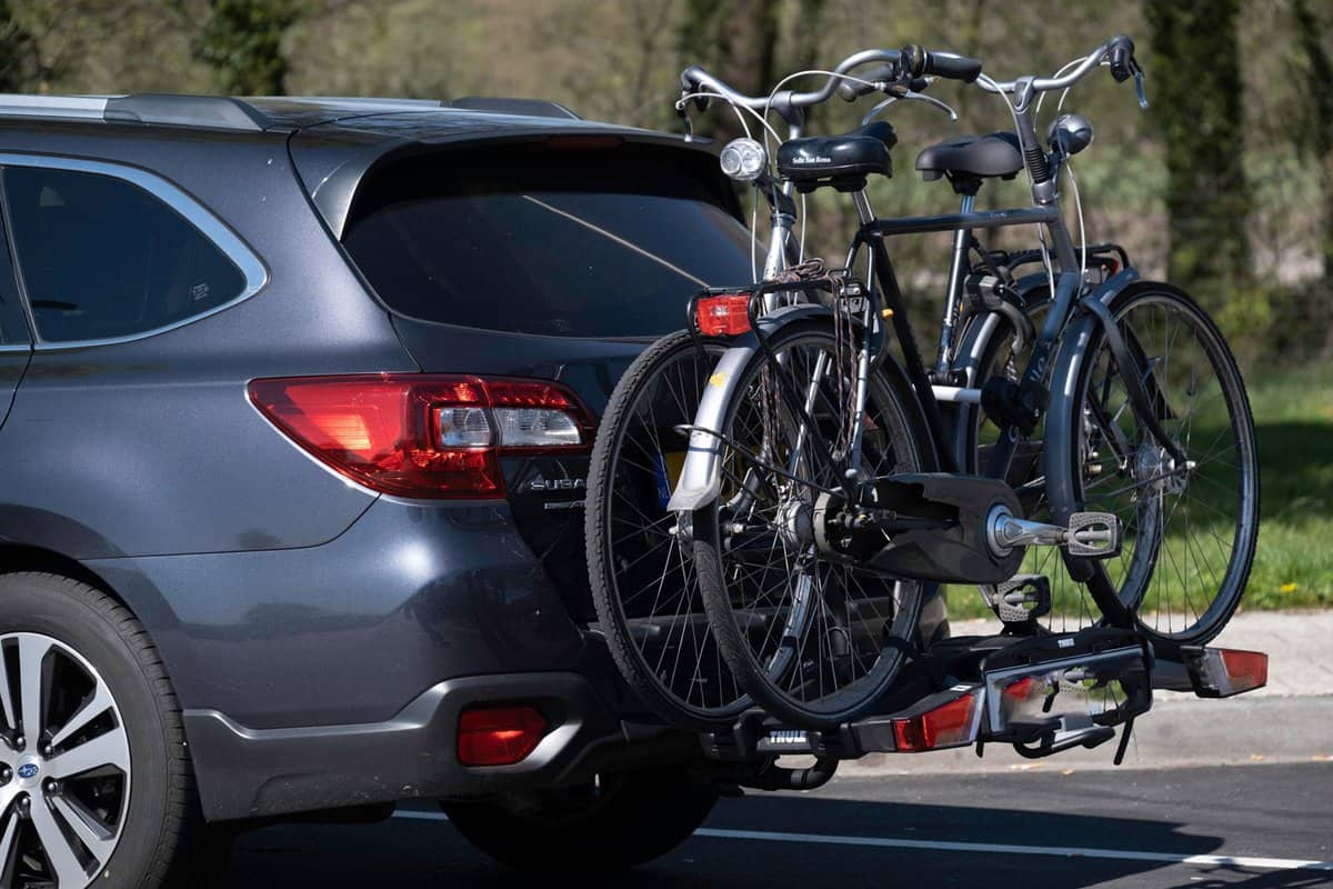 Bicycle carrier with two bicycles on the trailer hitch of a Subaru Outback