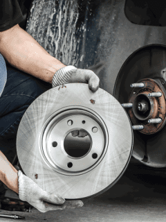 Brand new brake discs for garage cars. Auto mechanic. Is It Safe To Drive With Rusted Rotors [Here's What You Need To Know!]
