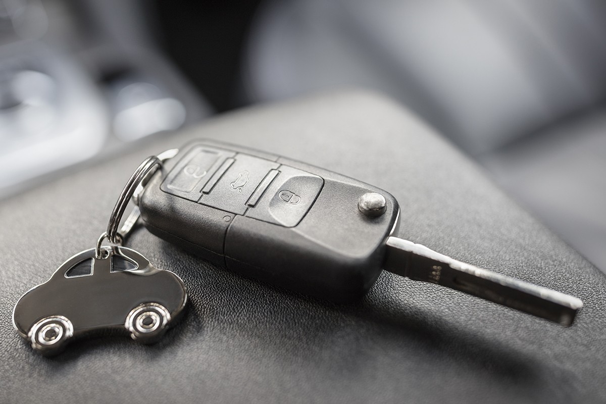 Car shape keyring and remote control key in vehicle interior