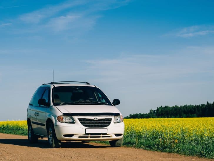 Chrysler Voyager in summer meadow landscape. on the background of yellow field, Why Is My Chrysler Voyager Central Locking Not Working?