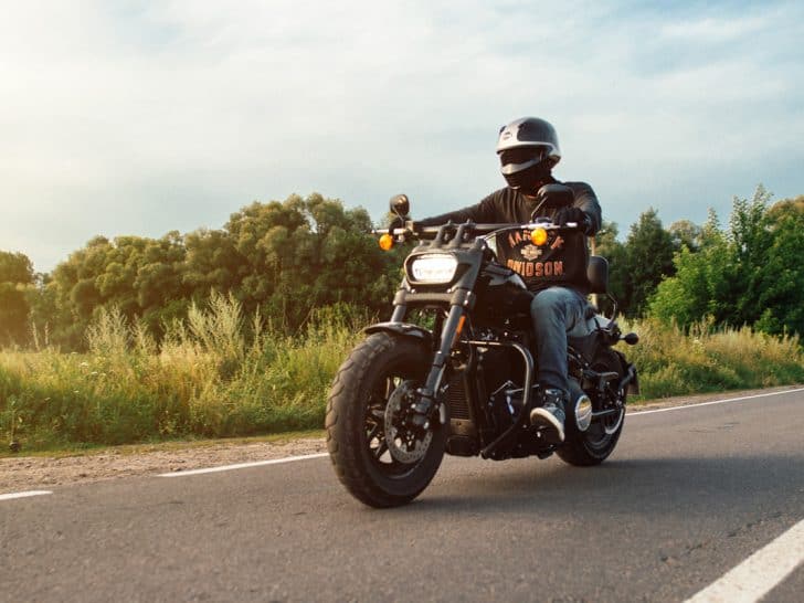 Harley Davidson Fat Bob 114 2020 motorcycle driver riding alone on a freeway, Why Does My Harley Davidson Pop On Deceleration? What Could Be Wrong?