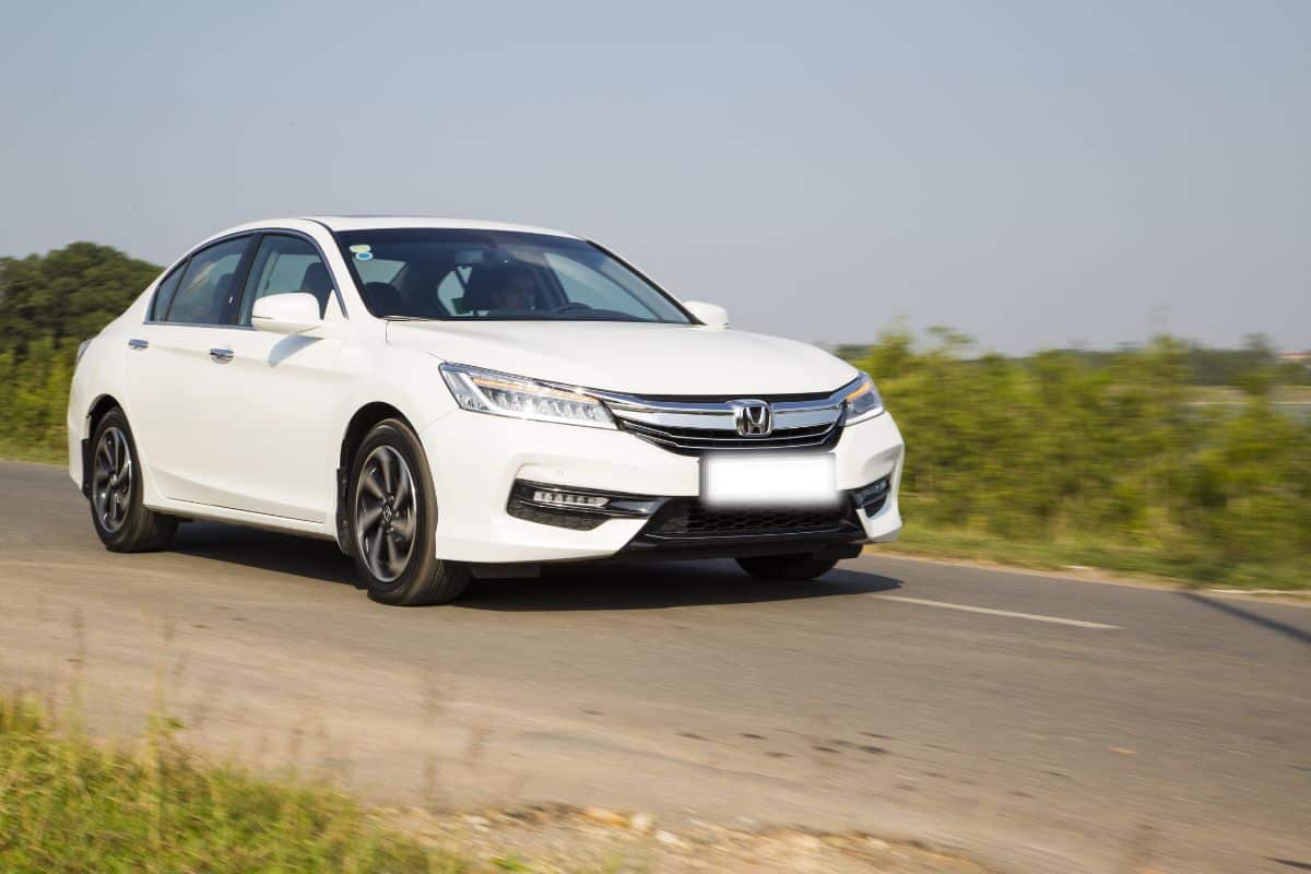 Honda Accord all new 2016 car is running on the test roat in test drive, Vietnam. (Image may contain noise,soft and blurry effect due to long exposure).