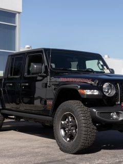 Jeep Gladiator display at a Jeep Ram dealer. The Stellantis subsidiaries of FCA are Chrysler, Dodge, Jeep, and Ram, What Are The Biggest Tires That Fit A Stock Gladiator?
