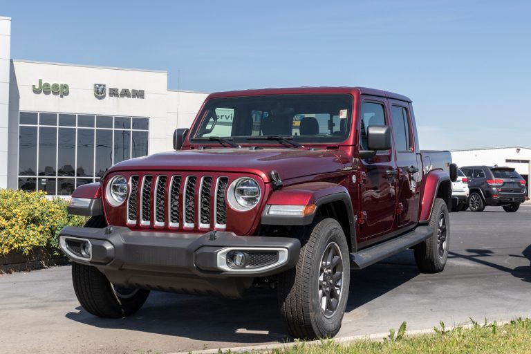 Jeep Gladiator display at a Jeep Ram dealer. The Stellantis subsidiaries of FCA are Chrysler, Dodge, Jeep, and Ram - How Much Weight Can A Jeep Gladiator Carry