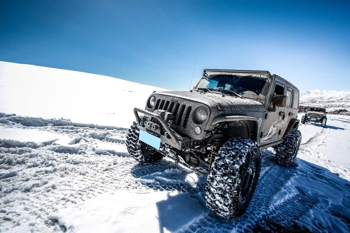 Jeep car adventure in the Snow Mountain