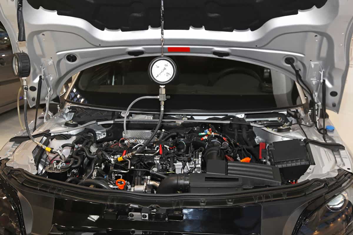 Petrol engine automotive compression test gauge service