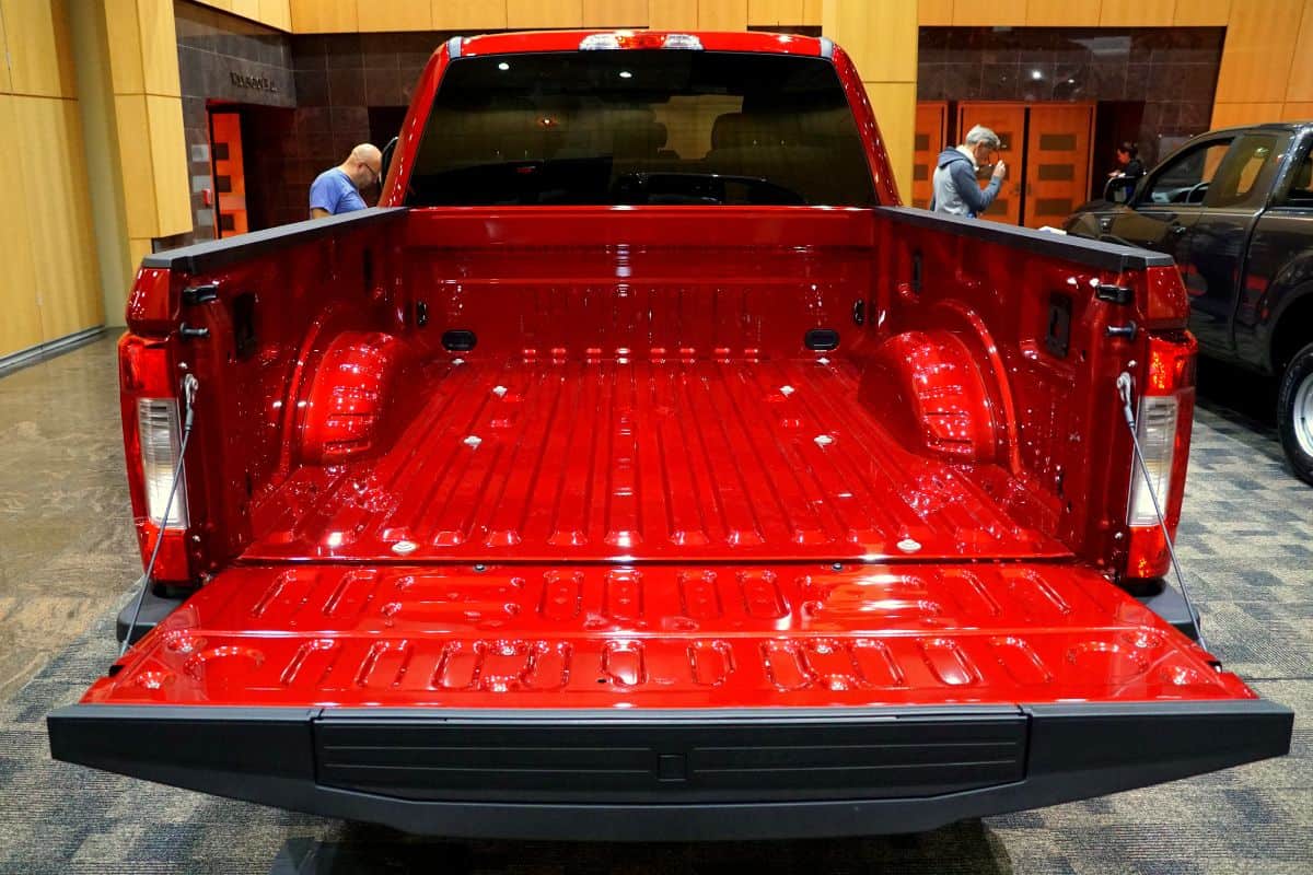 The tailgate of the 2020 Ford Super Duty truck in red color.