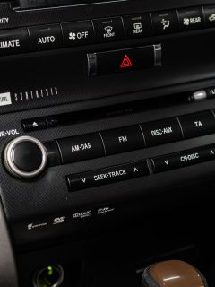 Toyota Land Cruiser 200, close-up of the dashboard and buttons, What's The Best FM Transmitter For Your Car [Inc. Bluetooth And Without Aux]?