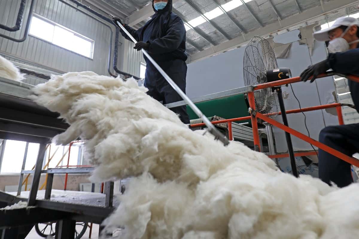 Worker working on ceramic fiber production line