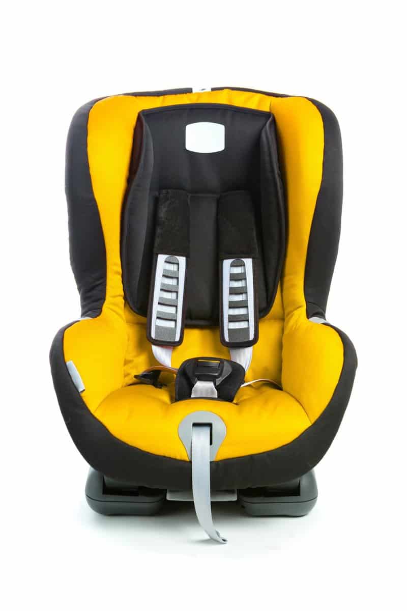 baby car seat, yellow color, isolated on white 